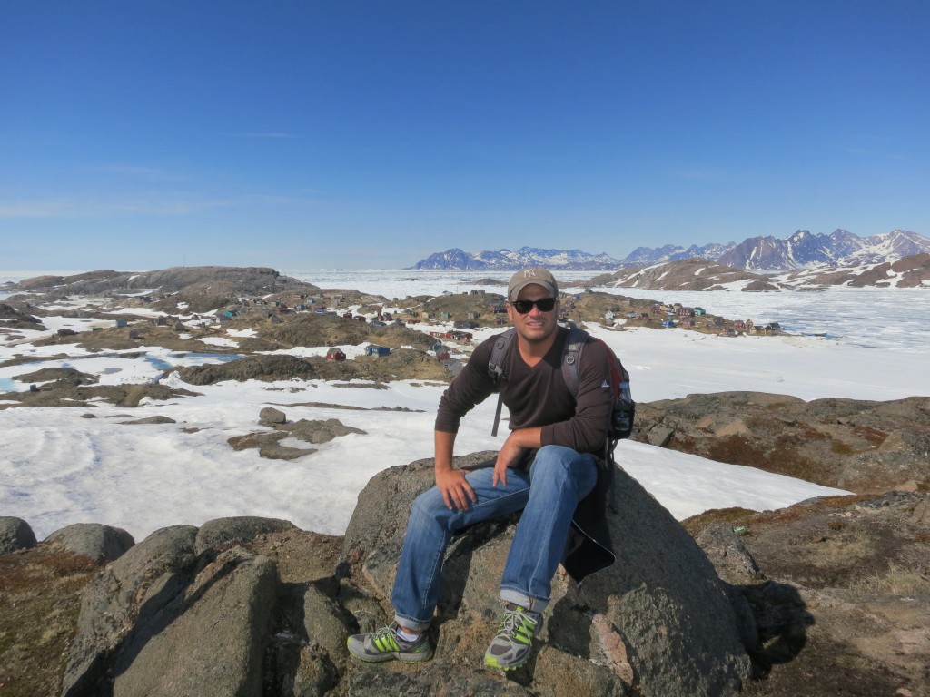 Atop a small village in Western Greenland