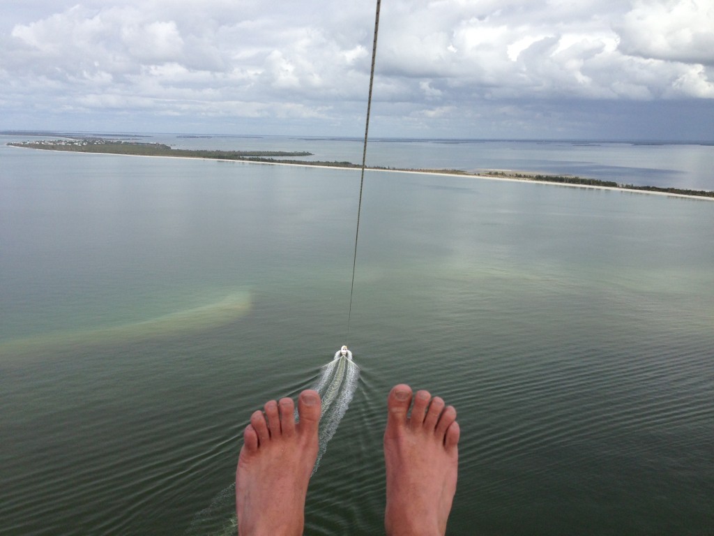 Look at those awesome toes parasailing high above Captiva Island, Florida