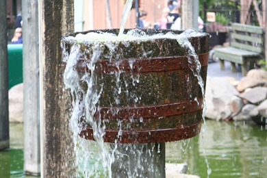 overflowing bucket