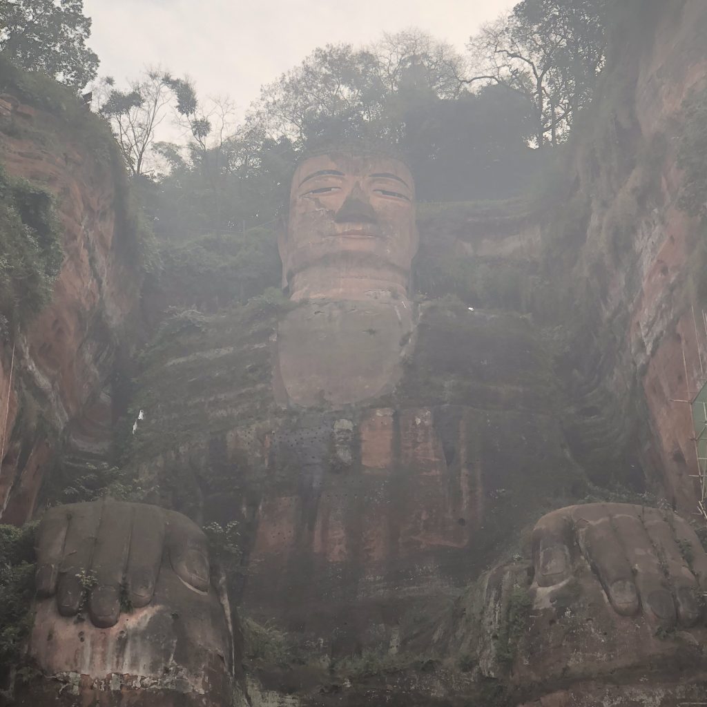 Its difficult to even see the Buddha from on the ferry because of smog